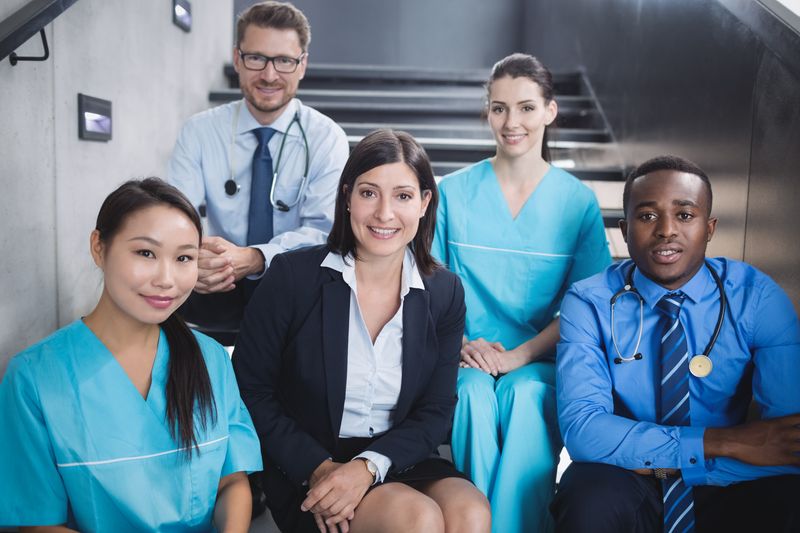 Healthcare team seated in a clinic